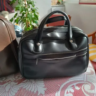 2 Bolsos de Viaje Vintage Marrón y Negro de cuero.