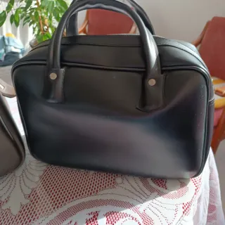 2 Bolsos de Viaje Vintage Marrón y Negro de cuero.