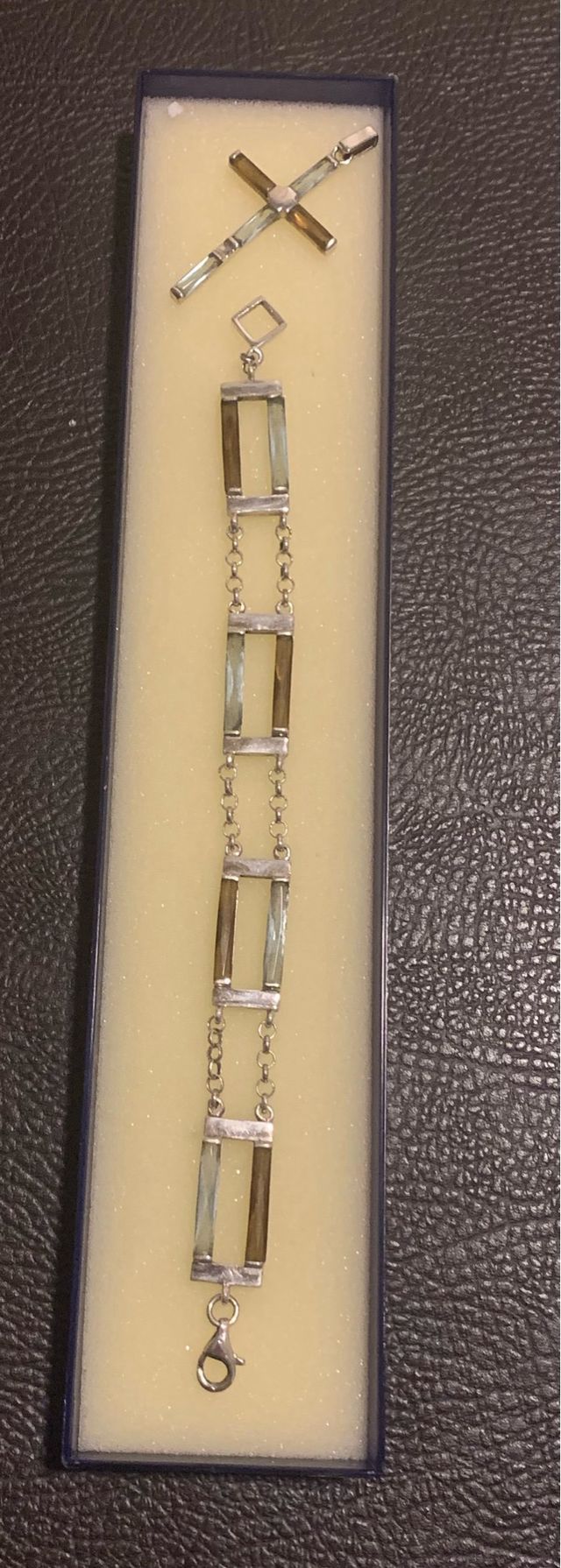 Pulsera y cruz de plata