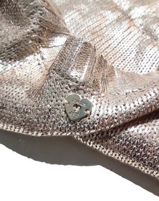 Twinset/ Jersey metalizado oro rosa talla S.