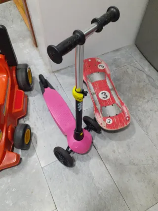 Patinete infantil musical rojo y rosa