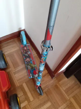 Patinete infantil musical rojo y rosa