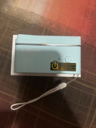 Máquina de etiquetas Polono azul y rosa