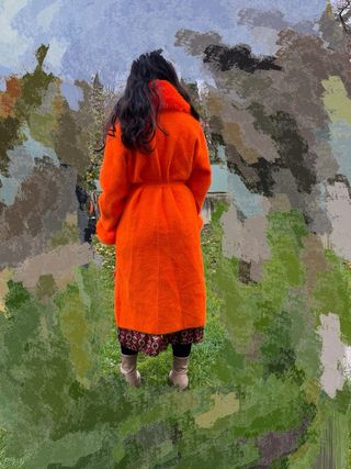 Abrigo largo naranja con pelo precioso