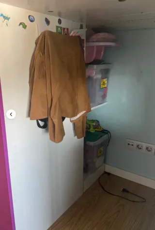 Cama alta con armario