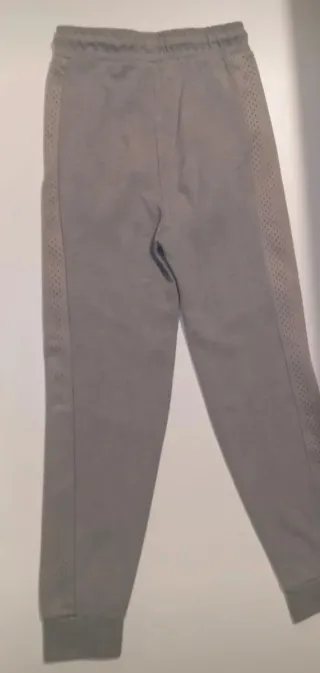 Chándal gris con cremalleras