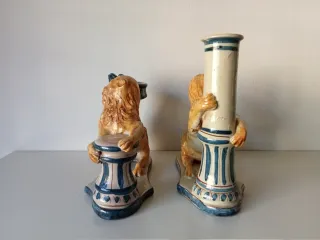 2 candeleros de león  en cerámica.