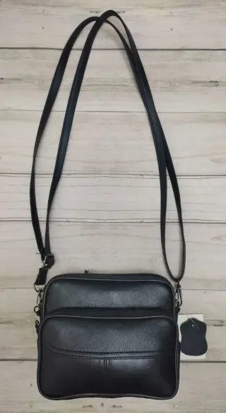 OFERTA. RIÑONERA DE PIEL. BOLSO MULTIUSOS NEGRO