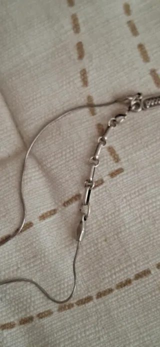 Colgante con cadena, marca Peccato