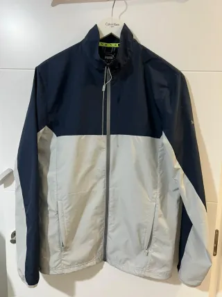 Cortavientos Puma azul y gris. SIN ESTRENAR