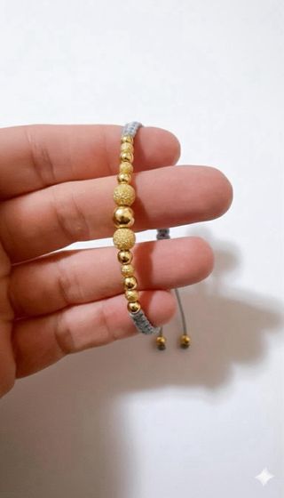 Bracciale Stoffa grigio con sfere in oro 18kt 750