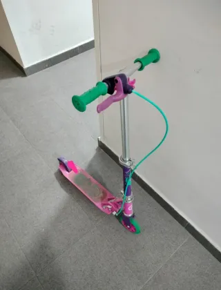 Patinete Oxelo rosa plegable