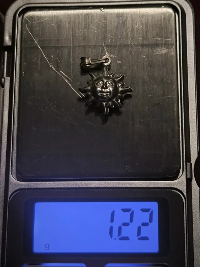 Cadena de plata con dije de Sol macizo