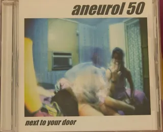 CD Aneurol 50 "Next to Your Door"