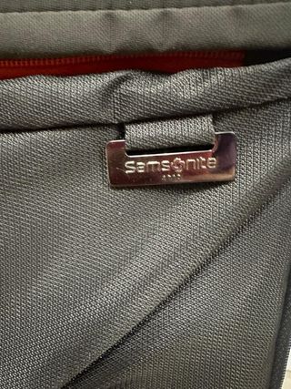 Maleta Samsonite gris y naranja