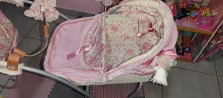 Carrito de muñecas reborn rosa