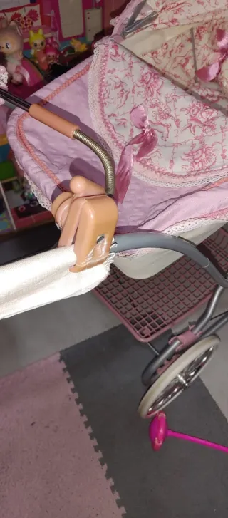 Carrito de muñecas reborn rosa