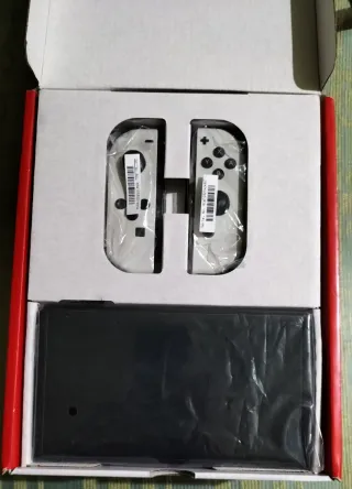 Nintendo Switch OLED + 128GB MicroSD