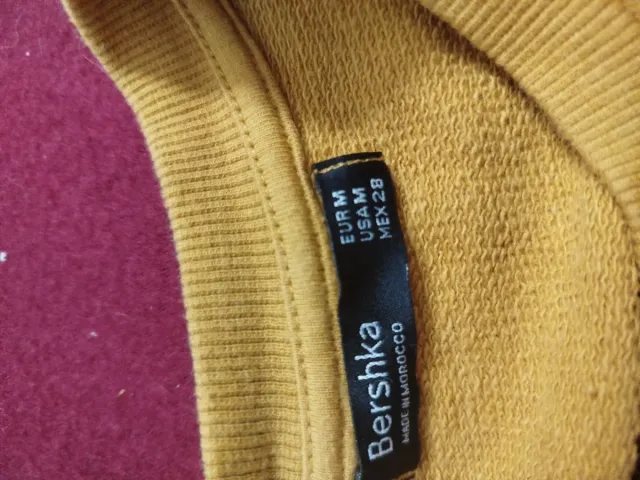 Sudadera Bershka volantes amarilla