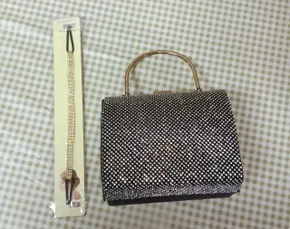 Bolso de fiesta negro y dorado