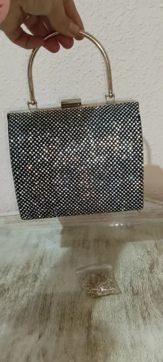 Bolso de fiesta negro y dorado