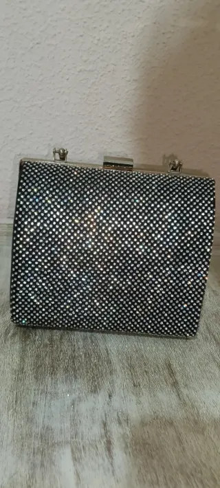 Bolso de fiesta negro y dorado