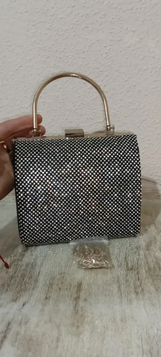 Bolso de fiesta negro y dorado