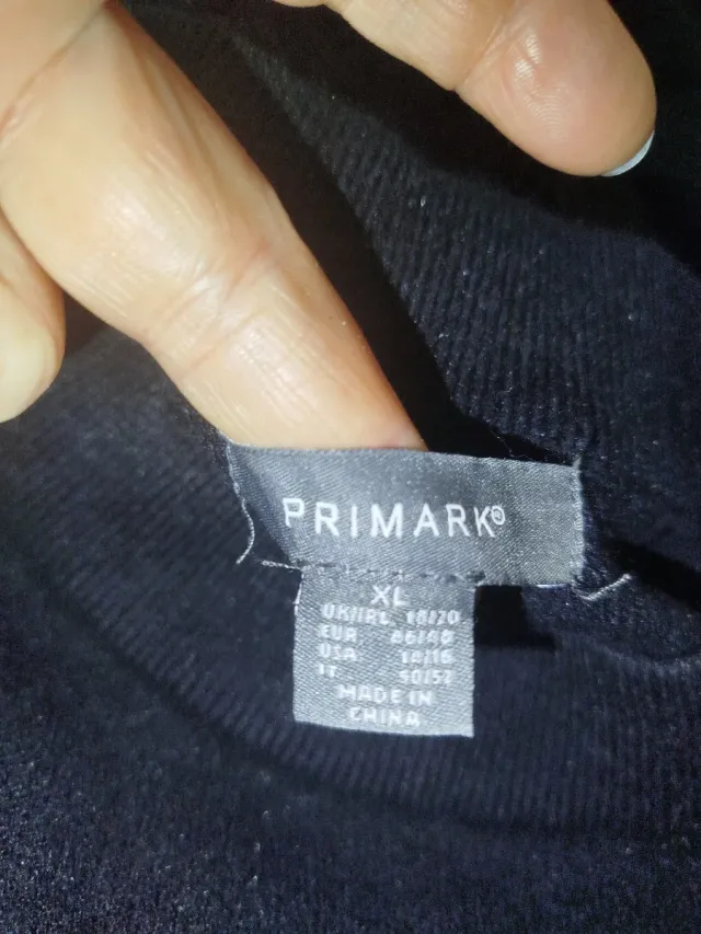 Jersey negro con cremallera