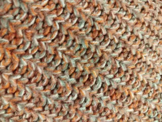 Jersey de punto gris y rosa