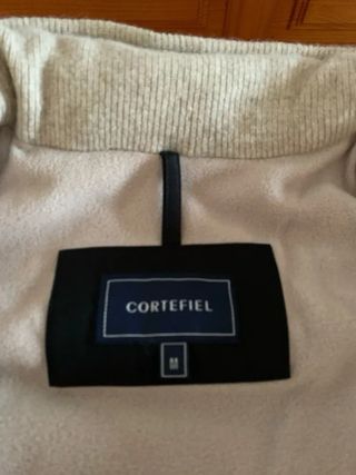 Cazadora con cuello alto