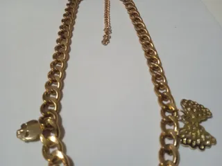 Collana color oro con chiave e charms donna
