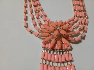 Collana donna colore oro e rosa con pietre e fiore