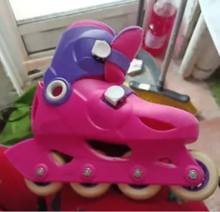 Patines en línea niña rosa y morado. Poco uso