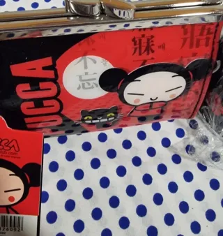 Monedero y hucha Pucca nuevos