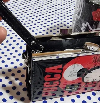 Monedero y hucha Pucca nuevos