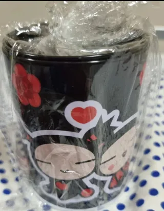 Monedero y hucha Pucca nuevos