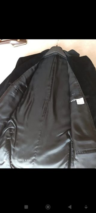 Americana de terciopelo negra