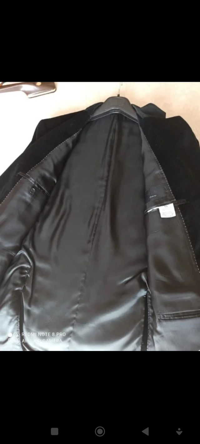 Americana de terciopelo negra