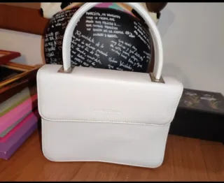 Bolso de fiesta azul con detalles dorados