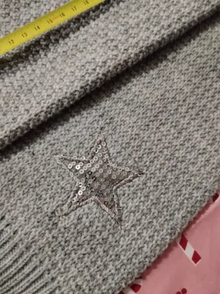 Scaldamuscoli grigi con stelle