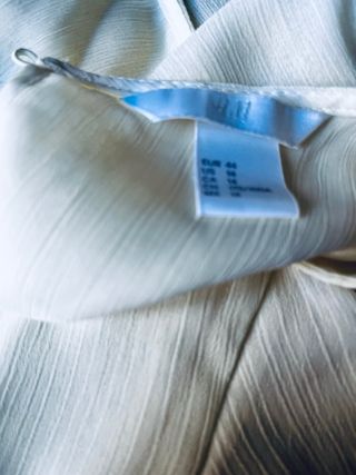 Top giro maniche con ruches