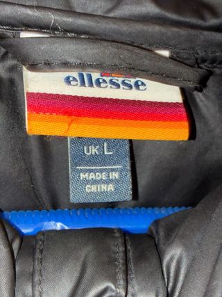 Anorak Canguro Ellesse Hombre Negro Naranja