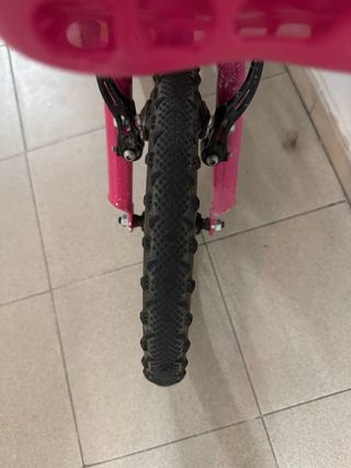 Bicicleta niña rosa con cesta
