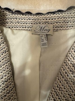 Chaqueta corta tweed beige y negra