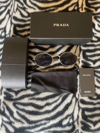 Occhiali da sole Prada oro e neri