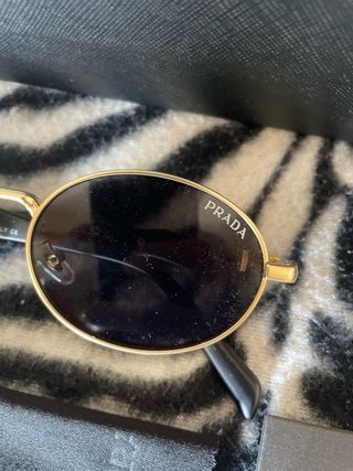 Occhiali da sole Prada oro e neri