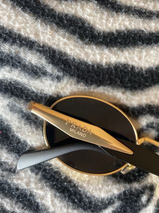 Occhiali da sole Prada oro e neri