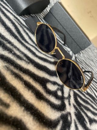 Occhiali da sole Prada oro e neri