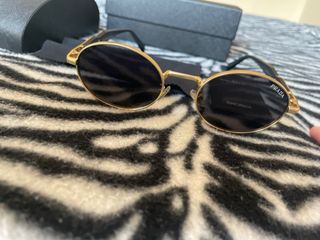 Occhiali da sole Prada oro e neri