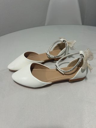 Zapatos comunión blancos con lazo